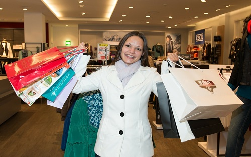 happy customer in clothing store